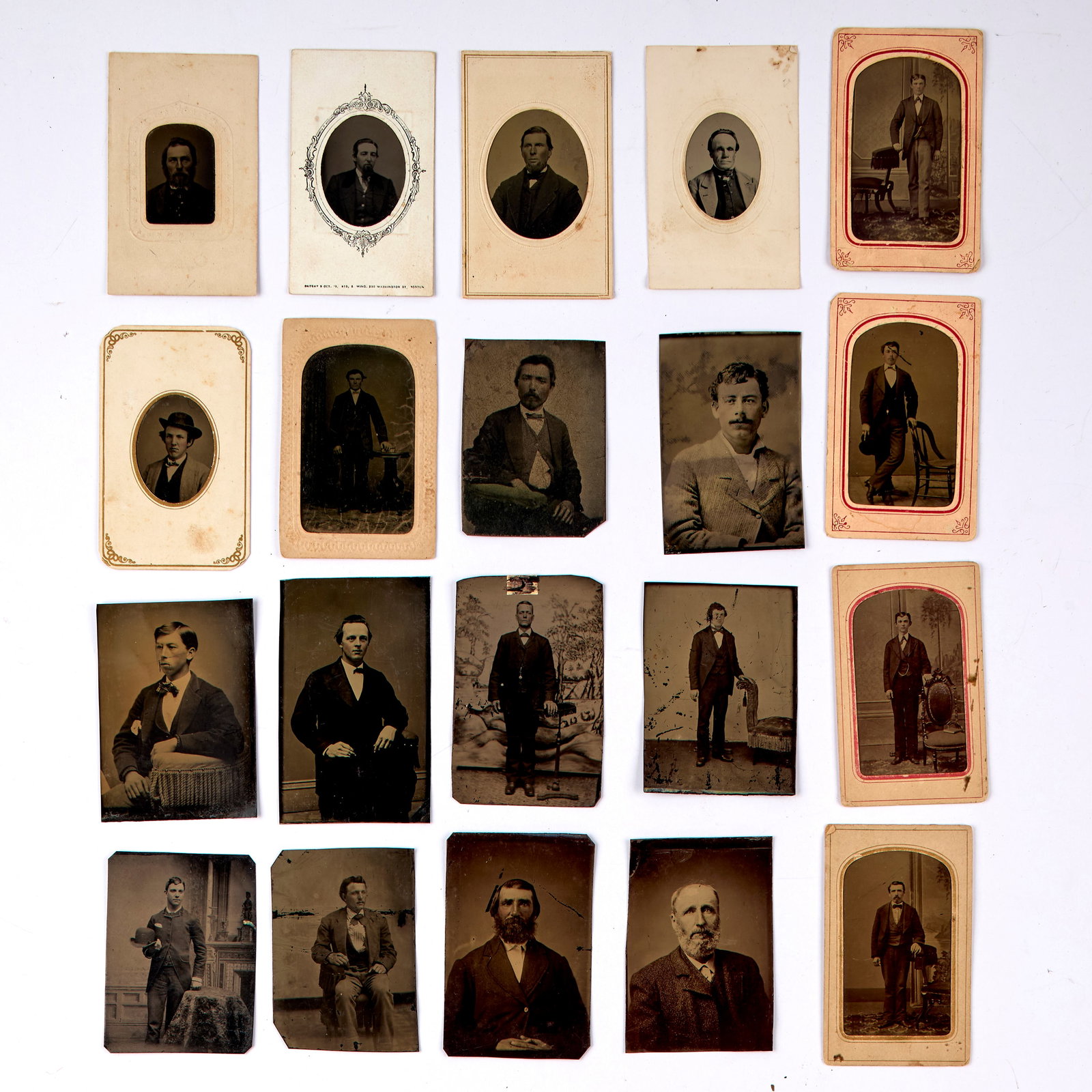 Tintype Collection of Men (19th Century): Twenty (20) tintype portraits of men in various poses. Loose and paper-mounted. Largest ; 4 x 2.5" Provenance: property of a private Connecticut collection. Shipping: At checkout, you can choose integ
