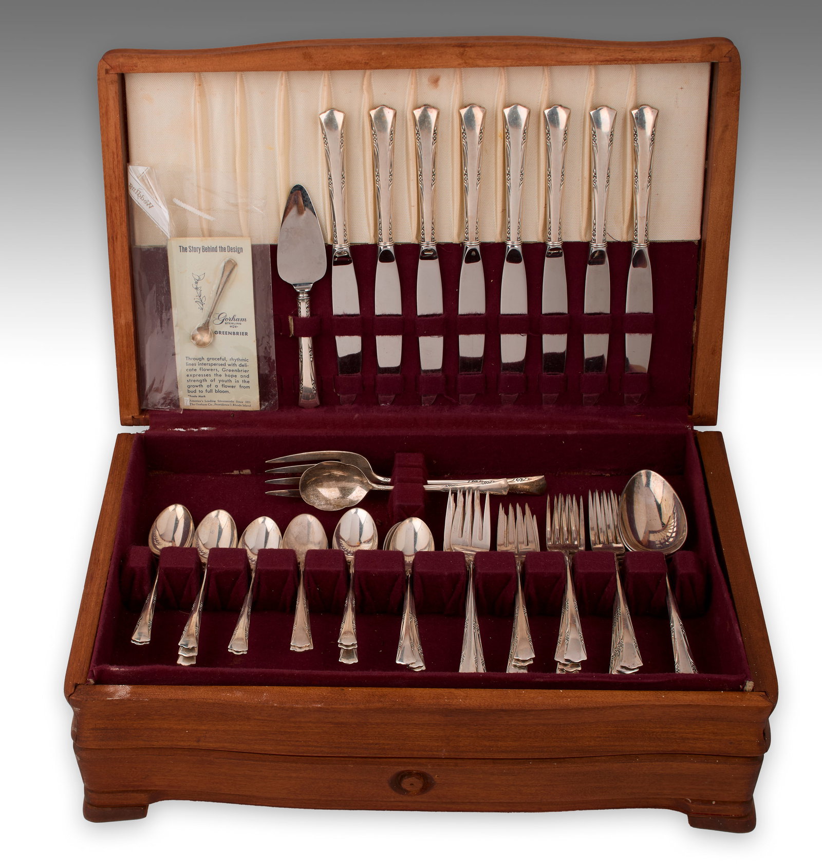 Gorham Sterling Silver Flatware: A fifty-five (55) piece service for eight (8). "Greenbrier" Pattern. Includes sixteen (16) teaspoons, two (2) large serving spoons, eight (8) dinner forks, eight (8) salad forks, eight (8) sterling ha