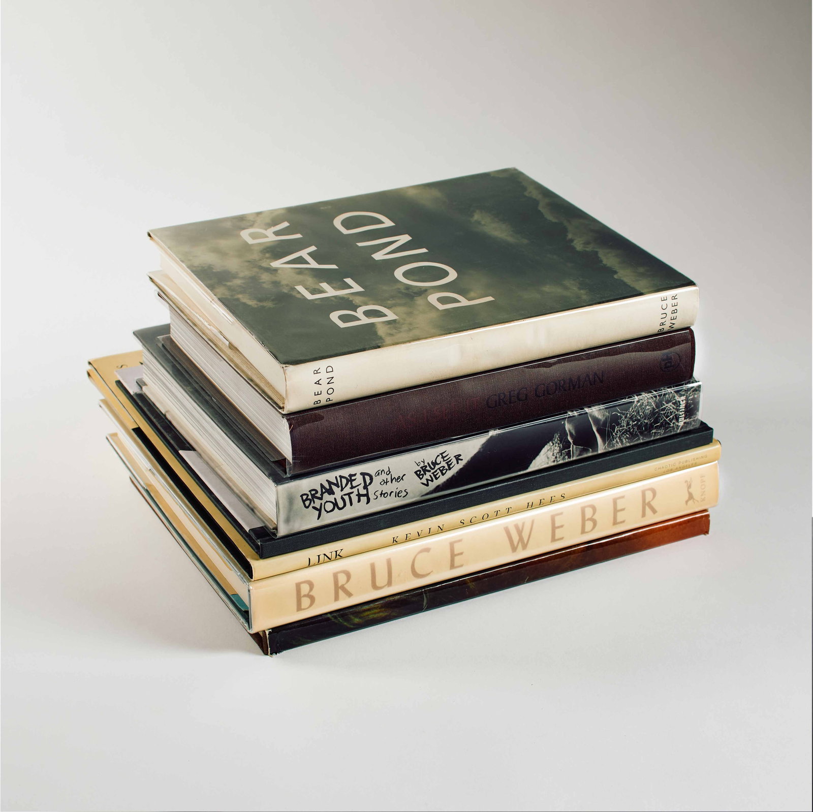 Homoerotic Male Nude Photo and Art Book Collection: Collection of seven (7) art books featuring male nudes, homoerotic subjects and fashion photography. Highlights include the Bruce Weber photo books, "Bruce Weber," "Bear Pond,