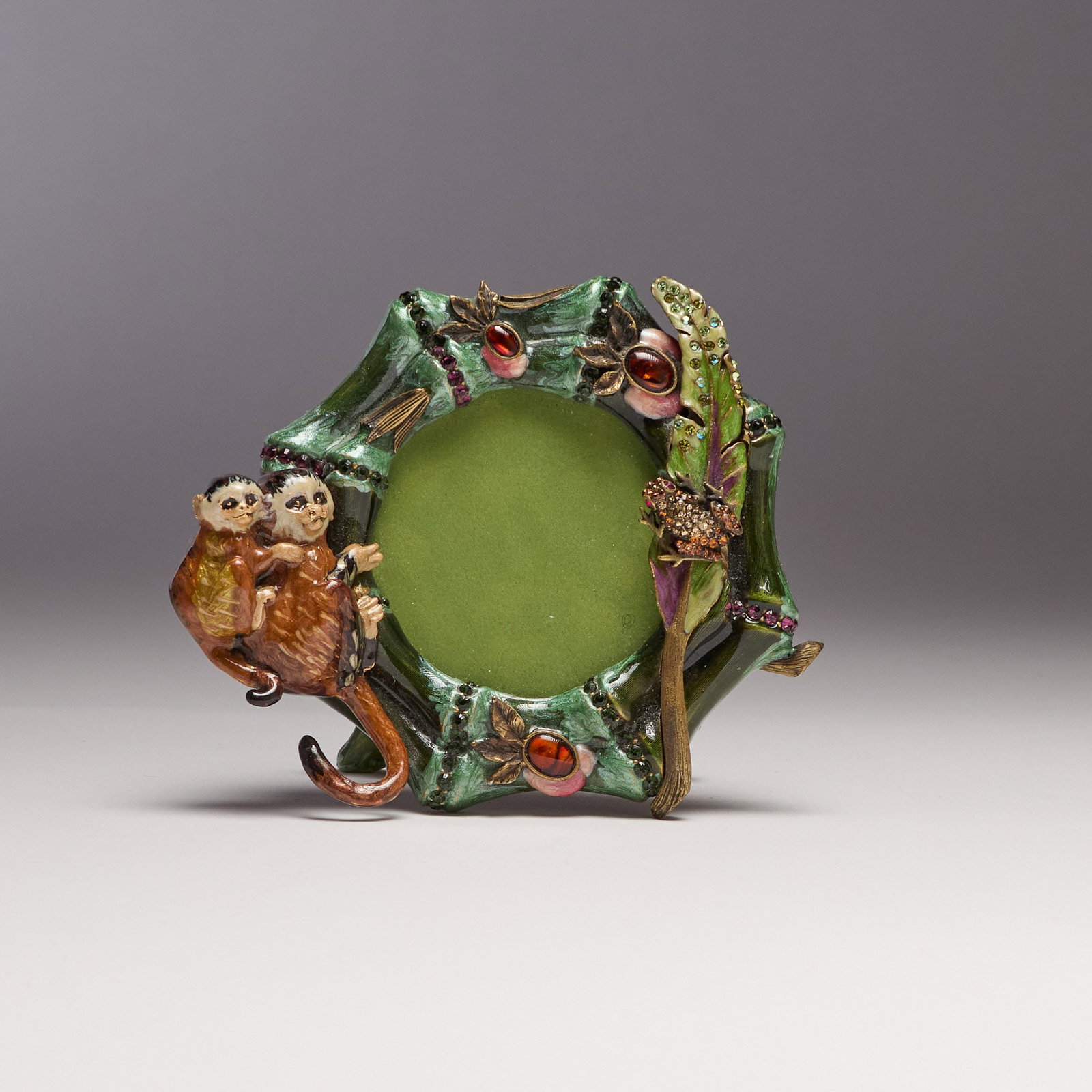 Jay Strongwater (Rhode Island): An embellished enameled frame adorned with marmosets and a frog. From the "Jungle" collection. In original box. 3 1/2 x 4".