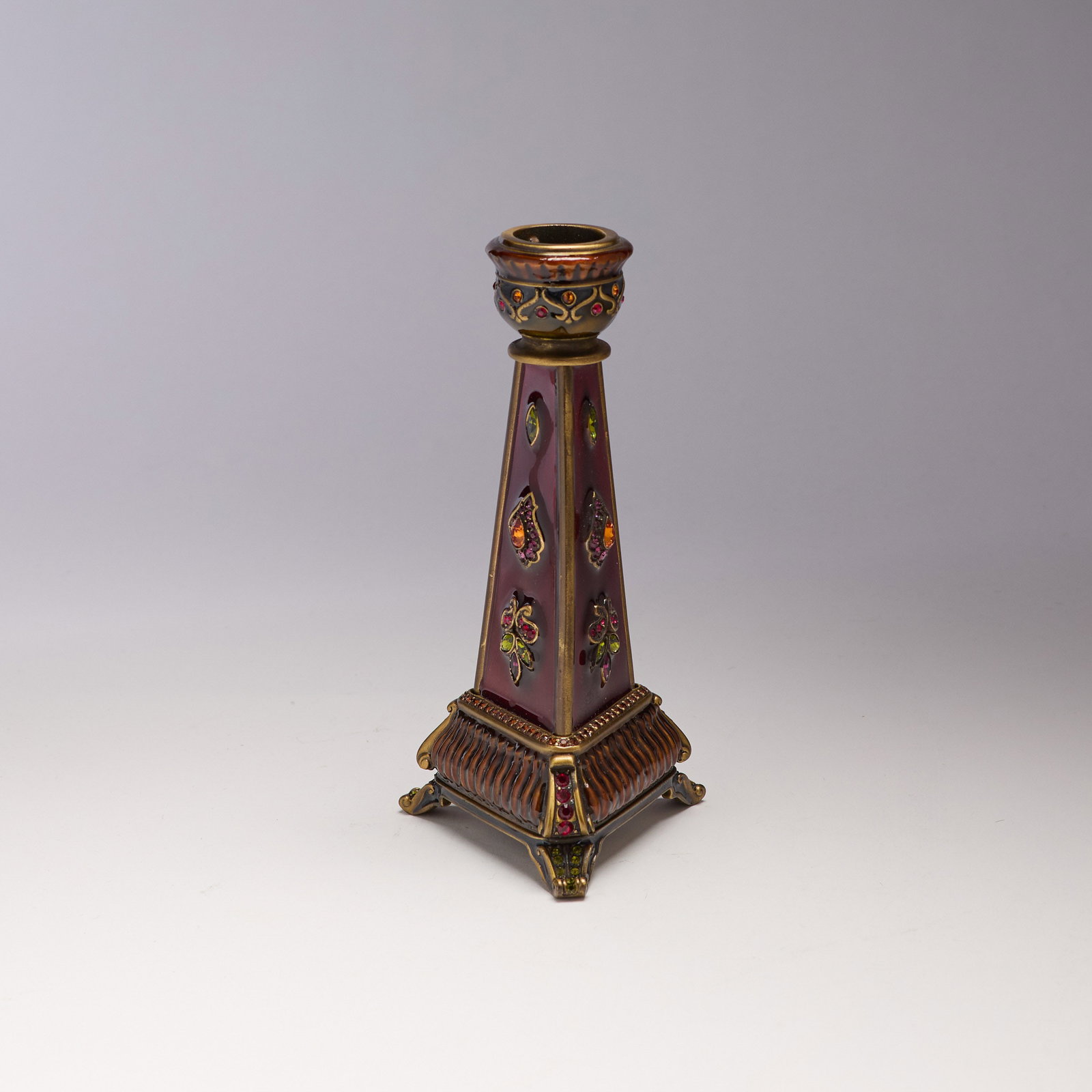 Jay Strongwater (Rhode Island): "Octavia." From the "Persia" collection. 7" obelisk candlestick. In Jay Strongwater box with dust bag. 7 x 3 1/4".