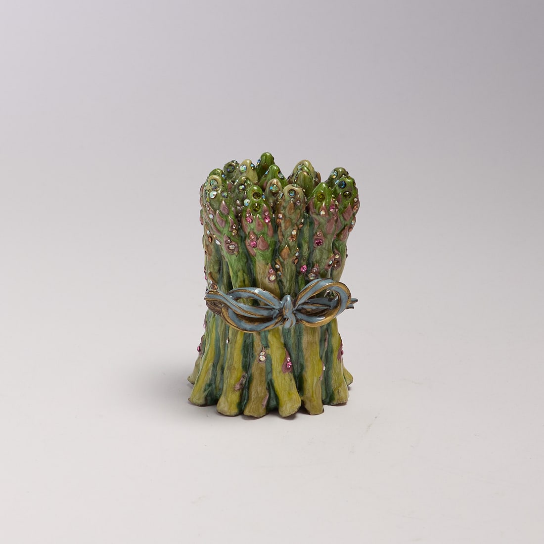 Jay Strongwater (Rhode Island): "Quincy". From the "Provence" Collection. An embellished and enameled asparagus trinket box. In Jay Strongwater dust bag. No box included. 3 x 2 1/4".