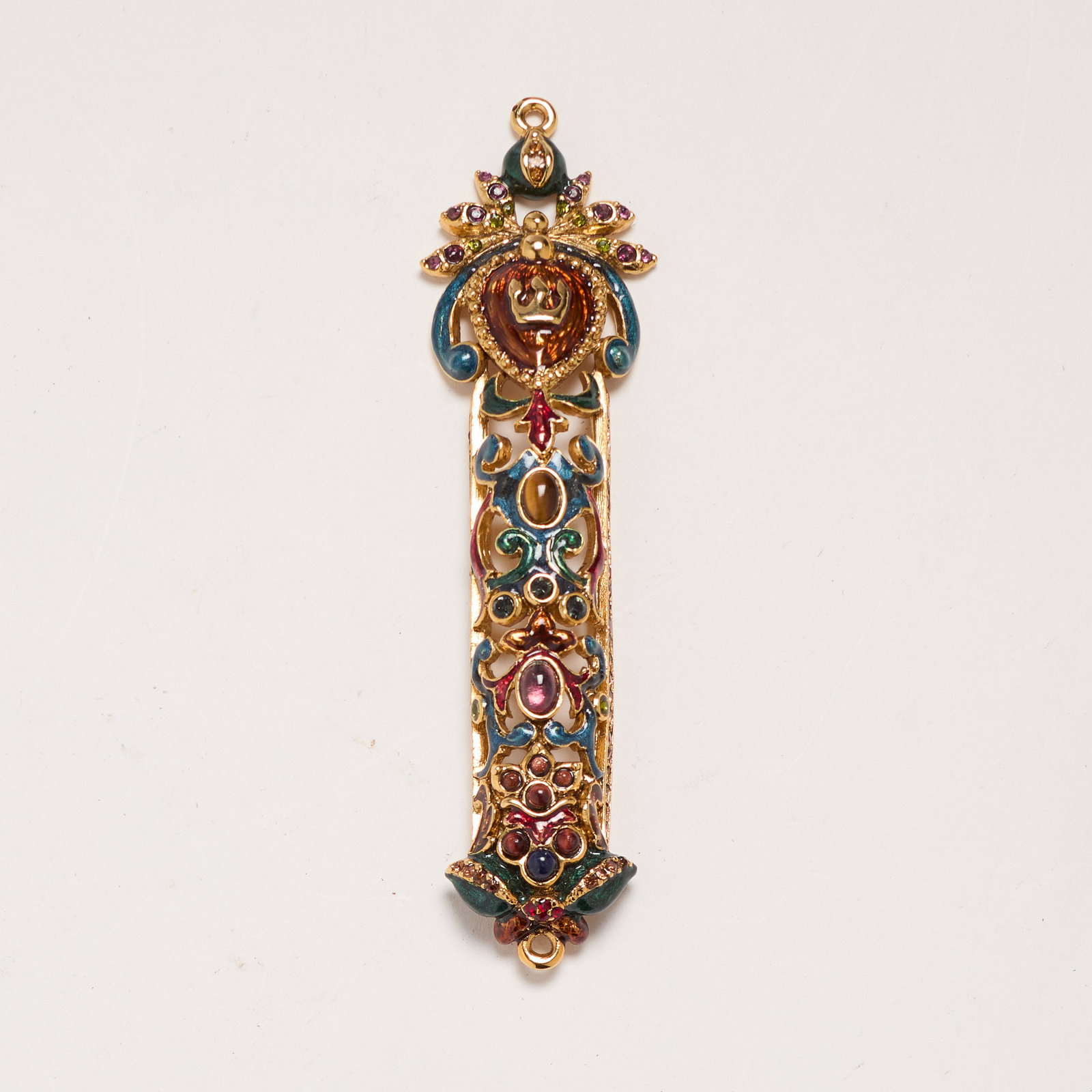 Jay Strongwater (Rhode Island): "Rebecca." From the "Great Gifts" collection. An embellished and enameled scroll mezuzah. In original box. 4 3/4 x 1 1/4".