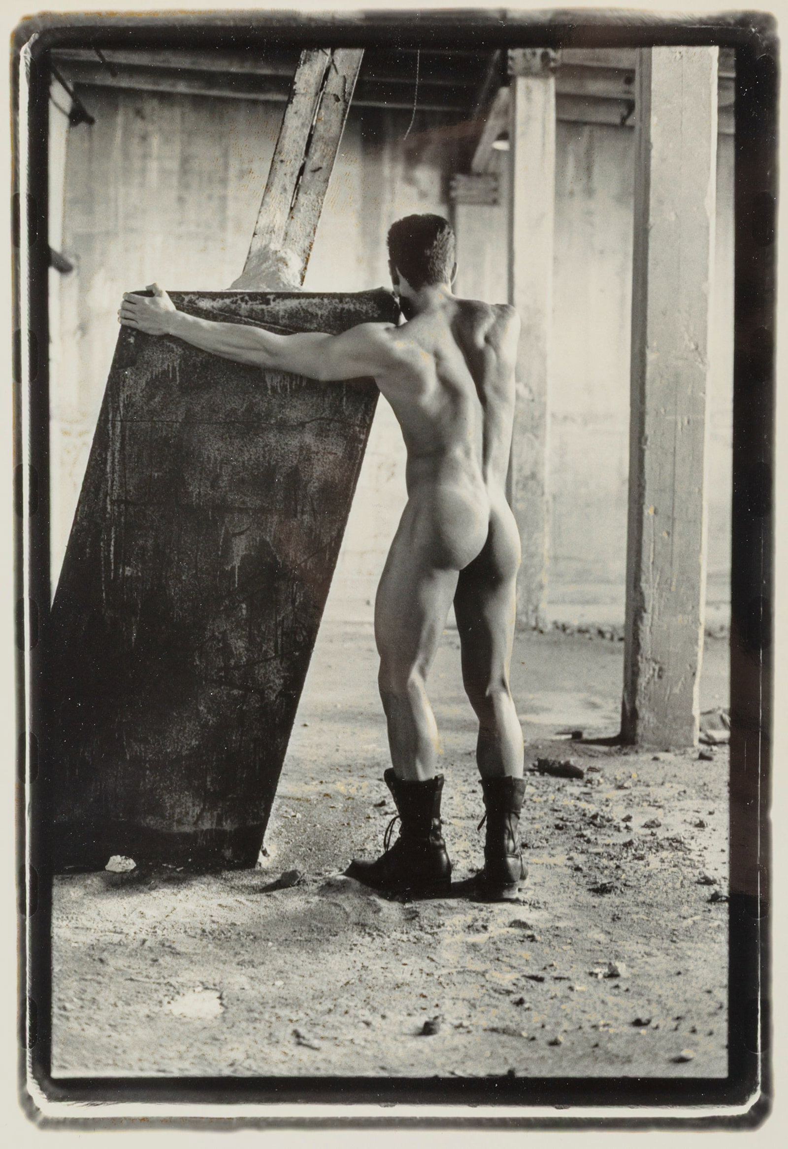 Bill Costa (American, 1944-1995): Embracing the Slab, 1993. Gelatin silver print. Photographer's stamp on the verso. 10 x 8 in. (25.4 x 20.3 cm.) Literature: Scharfman, Gary. Costa. New York: A Stonewall