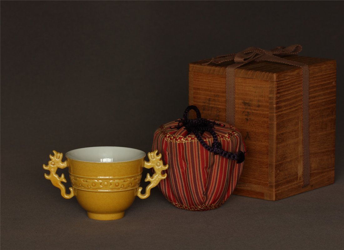 Yellow glaze carved cup of Qing Dynasty KangXi mark. (1 of 10)