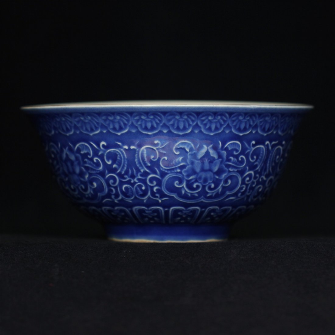 Blue glaze carving porcelain bowl of Ming Dynasty: Blue glaze carving porcelain bowl of Ming Dynasty XuanDe mark. Measure(inch), Height: 2-7/8, Diameter: 6-1/4.