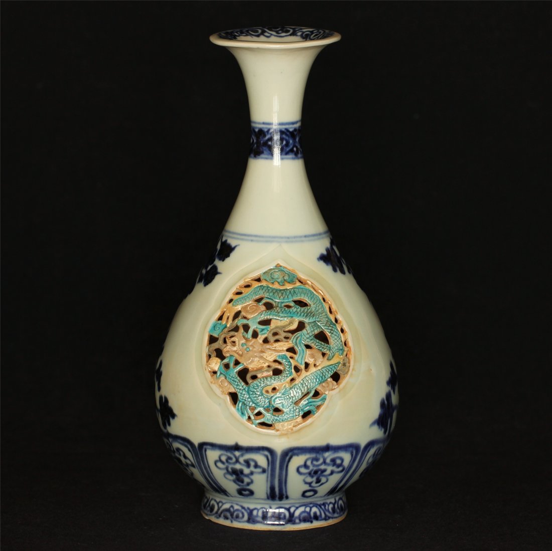 Blue and white carving porcelain vase.: Blue and white carving porcelain vase. Measure(inch), Height: 9-7/8, Diameter: 4-7/8.