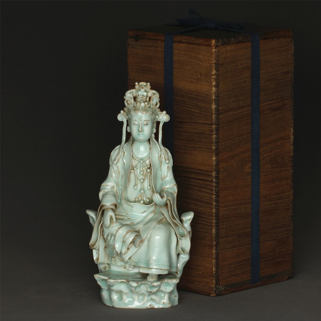 A "YingQin" Porcelain 'KuanYin' Statue Song Dynasty.: A "YingQin" Porcelain 'KuanYin' Statue Song Dynasty. With box. Statue Measure(inch), Height: 9-7/8, Length: 4-3/4 , Width: 3-1/8 .