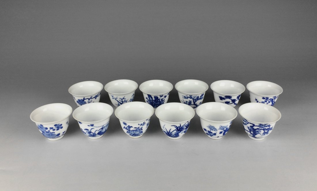 Chinese Antique Blue & White 12 Flower Porcelain Cups: Chinese Antique Blue & White 12 Flower Porcelain Cups. Measure: 1 7/8" Height, 2 5/8" Diameter