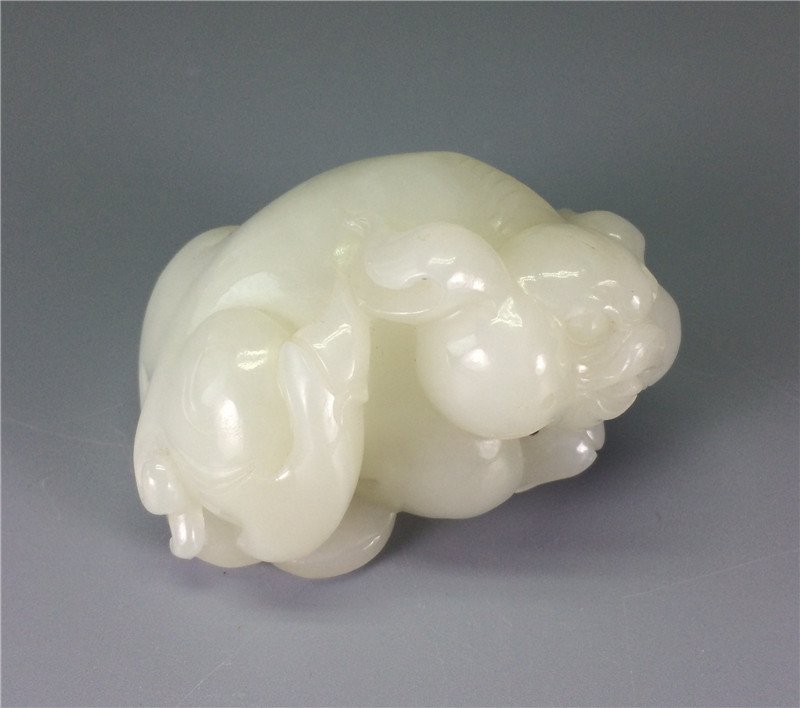Chinese white jade carved swine and coin (1 of 10)