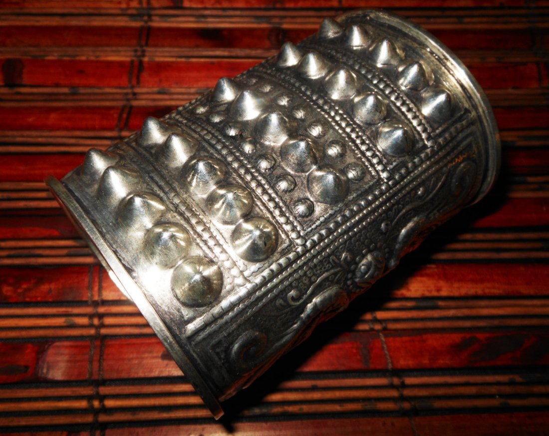 Awesome spiked wide cuff bracelet from the Miao Hmong h: awesome spiked wide cuff bracelet from the miao hmong hill tribes. spectacular!;this piece was made by the hmong hill tribes in northern laos (near the china border). the metal is a mixture of silver 