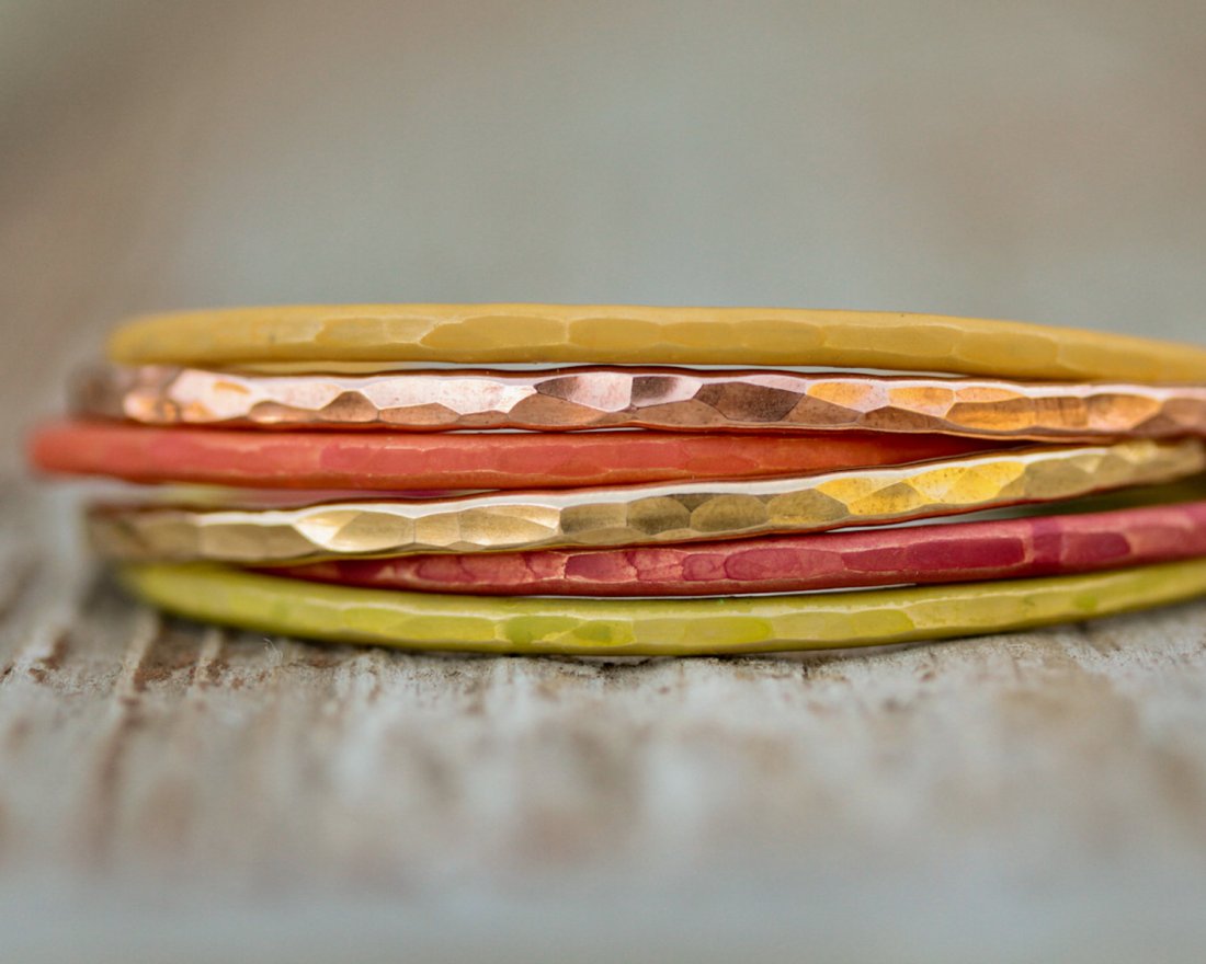 SUNSET Skinny CUFFS as part of our Beachcomber Collecti: sunset skinny cuffs as part of our beachcomber collection. these are pretty much like wearing summer on your arm. this listing is for six mixed patina and metal boho skinnies in the following tones - 