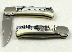 Scrimshaw by Sabre Deer Pocket Knife: Scrimshaw by Sabre Deer Pocket KnifeMeasures: Stainless steel locking blade. Cabin scene on one side, Deer on the other. 4" X 1 1/4" X 1/2" With open blade 7 1/4"
