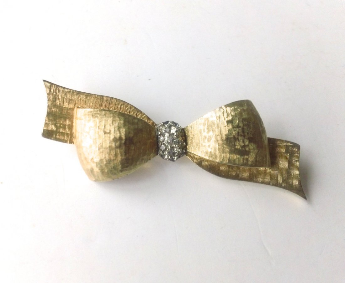 Mazur-Jomaz Rhinestone Bow Brooch...;Mazer Bros was fou: mazur-jomaz rhinestone bow brooch...;mazer bros was founded by lincoln and joseph mazer in the 1920's in new york.. known for high quality jewelry, their pieces command high prices. this sweet brooch