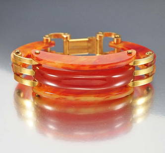 Marvelous Machine age graphic lines come together in th: marvelous machine age graphic lines come together in this vintage tortoise shell art deco bakelite bracelet! curved shapes of bakelite, two thinner ones with a thick center link, are bolt hinged to cu