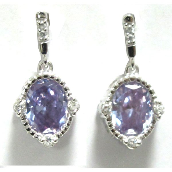 Sterling Silver-Tanzanite Earrings: sterling silver-tanzanite earrings Legend says that it was Masai cattle herders that first noticed this stone some 30 years ago after a fire caused by lightening burned areas in Tanzania. The herders