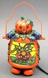 Jack O Lantern Mosaic Lamp: Jack O Lantern Mosaic LampMeasures: Mosaic style resin Jack O Lantern with metal bail to hang or will sit on table or other flat surface. Beautiful cheerful design great addition to your home dcor. Ha