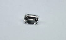 White emerald-cut F colour VS2 diamond