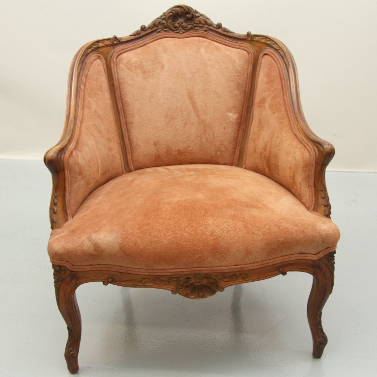 HEAVILY CARVED SLIPPER FRENCH LADIES CHAIR: Heavily carved slipper French ladies chair with suede upholestry. 29"H X 24.25"W X 18"W