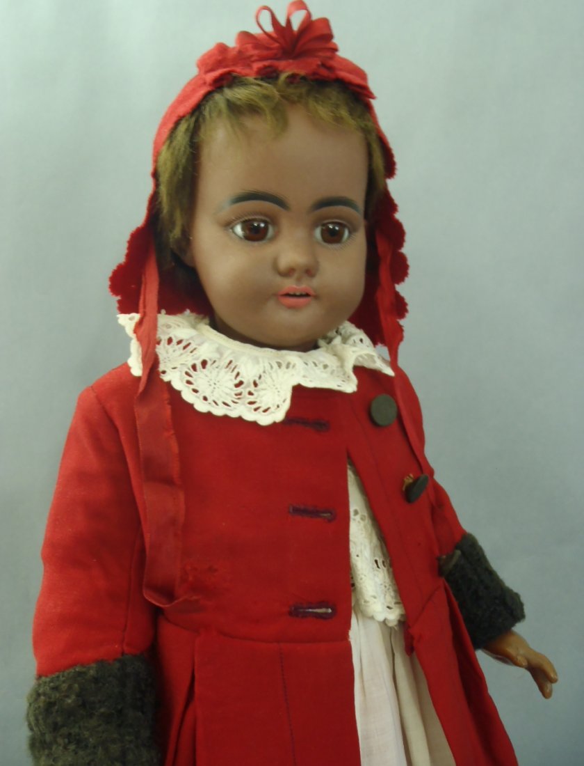 ALL ORIG. BROWN-COMPLEXION BISQUE DOLL BY SIMON HALBIG: When it comes to dolls that make a statement, and have a value that is beyond what the eye can see, all-original dollies are always the way to go. She is 20" (51 cm.) Bisque socket head with rich brow