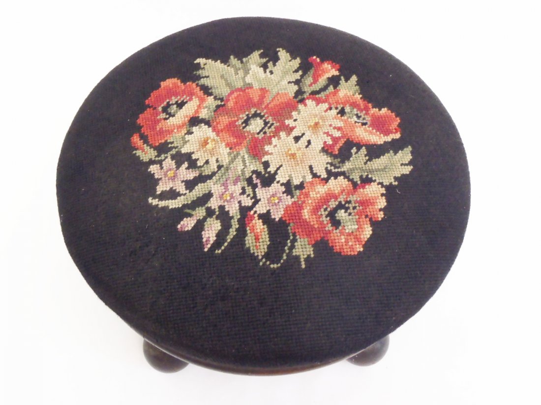 19th Victorian foot Stool Rest Covered in 19th: needle point Poppies, 19 inch in diameter and 6 inch tall