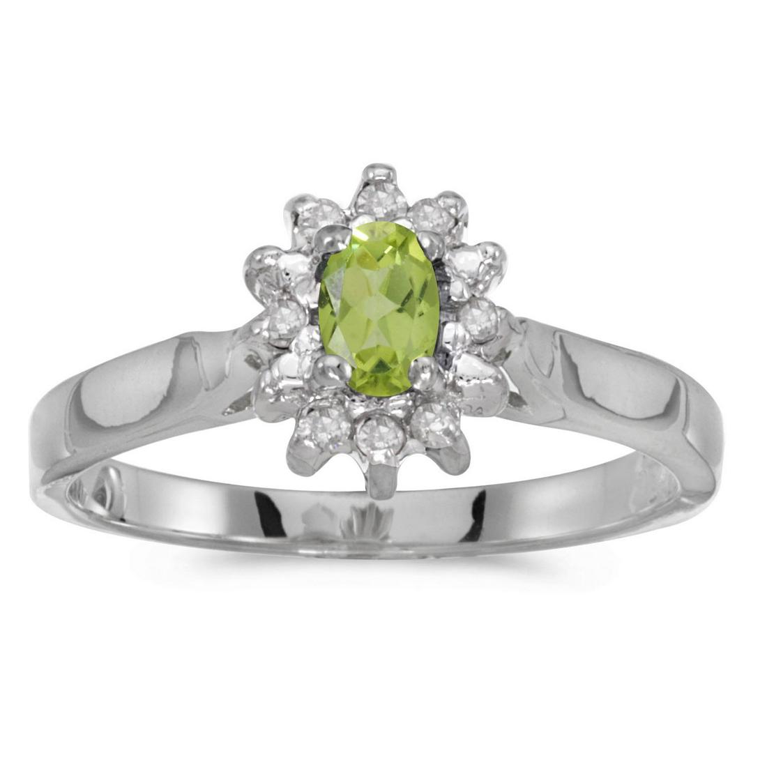 14k White Gold Oval Peridot And Diamond Ring 0.27 CTW: 14k White Gold Oval Peridot And Diamond Ring 0.27 CTW -- METAL PURITY: 14k ;METAL TYPE: White gold ;GEM TYPE: peridot ;MAIN STONE COLOR: Green ;MAIN STONE SHAPE Oval ;STONE CLARITY: ;STONE COLOR: ;STO