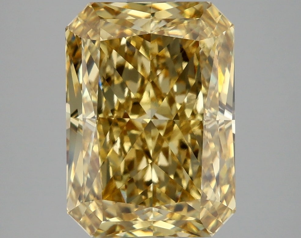 5.04 ctw. VVS2 IGI Certified Radiant Cut Loose Diamond (LAB GROWN): 5.04 ctw. VVS2 IGI Certified Radiant Cut Loose Diamond (LAB GROWN) -- IGI Certified Radiant Cut Loose Diamond (LAB GROWN) - Weight :- 5.04 ctw; Color :- Fancy Vivid Yellow; Clarity :-VVS2 #NGFY71090v1