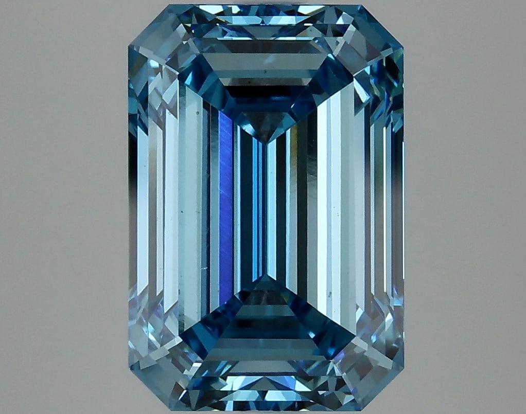 4.91 ctw. VS2 IGI Certified Emerald Cut Loose Diamond (LAB GROWN): 4.91 ctw. VS2 IGI Certified Emerald Cut Loose Diamond (LAB GROWN) -- IGI Certified Emerald Cut Loose Diamond (LAB GROWN) - Weight :- 4.91 ctw; Color :- Fancy Vivid Blue; Clarity :-VS2 #NGFY69233v14