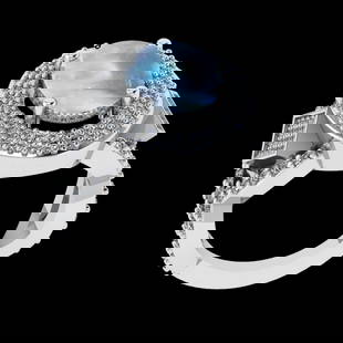 6.37 Ctw VS/SI1 Rainbow Moonstone And Diamond 14K White Gold Engagement Rin: Center Stone Weight : 5.35 Ctw ( Oval Cab ) Center Stone Color : Rainbow Moonstone Stone Setting : Prong Side Diamond Weight Of Ctw 1.02 Ctw Side Stone Color : J-K Stone Clarity : VS/SI1 Stone Setting