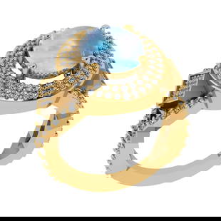 6.37 Ctw I2/I3 Rainbow Moonstone And Diamond 10K Yellow Gold Engagement Rin: Center Stone Weight : 5.35 Ctw ( Oval Cab ) Center Stone Color : Rainbow Moonstone Stone Setting : Prong Side Diamond Weight Of Ctw 1.02 Ctw Side Stone Color : J-K Stone Clarity : I2/I3 Stone Setting