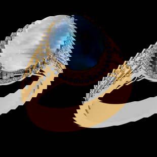 5.95 Ctw VS/SI1 Rainbow Moonstone And Diamond 14K Yellow Gold Engagement Ri: Center Stone Weight : 5.35 Ctw ( Oval Cab ) Center Stone Color : Rainbow Moonstone Stone Setting : Prong Side Diamond Weight Of Ctw 0.60 Ctw Side Stone Color : J-K Stone Clarity : VS/SI1 Stone