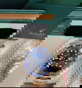 Used 18kt Full Gold Rolex Submariner Smurf Comes with Box & Papers