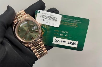 New 18kt Rose Gold 40mm DayDate Green Dial Rolex comes with Box & Papers