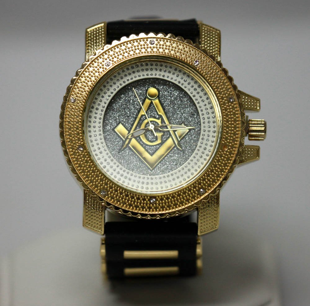 MODERN GOLD MASONIC WATCH W/ SILVER BACK GROUND: MODERN GOLD MASONIC WATCH W/ SILVER BACK GROUND **|**|** MODERN GOLD MASONIC WATCH W/ SILVER BACK GROUND AND BLACK RUBBER STRAPW/ BLACK MASONIC G SYMBOL