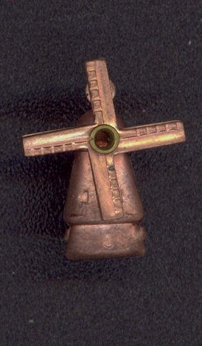 Copper Plated Windmill Charm with Moving Blades and Cha: Copper Plated Windmill Charm with Moving Blades and Cha **|**|** Vintage 7/8" tall copper coated steel windmill charm. The blades swivel. These are old store stock from the late 1940s in unused condit