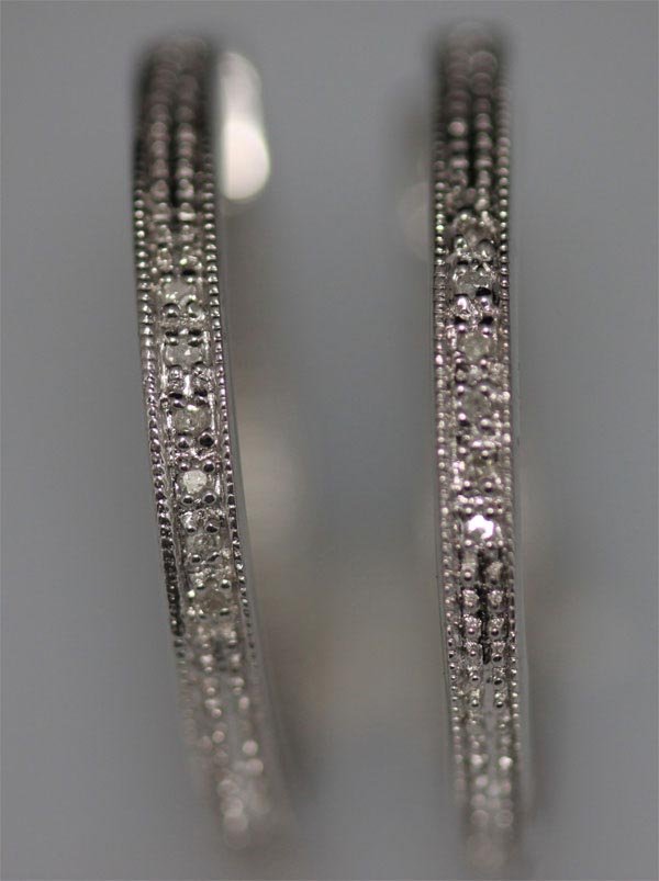 0.06 CTW DIAMOND RING .925 STERLING SILVER: 0.06 CTW DIAMOND RING .925 STERLING SILVER **|**|** 0.06 CTW DIAMOND RING .925 STERLING SILVER #38910v1