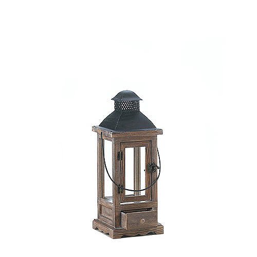 Mount Vernon Wooden Lantern - Small: Mount Vernon Wooden Lantern - Small **|**|** Light up your nights with this small lantern thats big on charm. The wooden framework gives way to a black metal roof with a hanging handle, and below is a