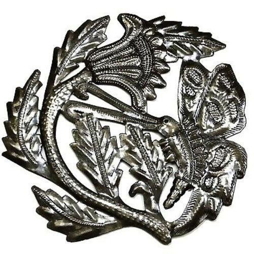 Flower and Butterfly Metal Drum Art 8-inch Diameter - C: Flower and Butterfly Metal Drum Art 8-inch Diameter - C **|**|** This 8-inch diameter flower and butterfly design is hand cut and embossed from steel oil drums in Haiti. The varnished piece is suitabl