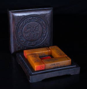 Chinese tianhuang steals iin zitan wood box: All four four character seals with various foliage carved on one side and caligraphy carved on other side. In custom fitted carved zitan wood box; the lid with carved symbol the interior where seals s