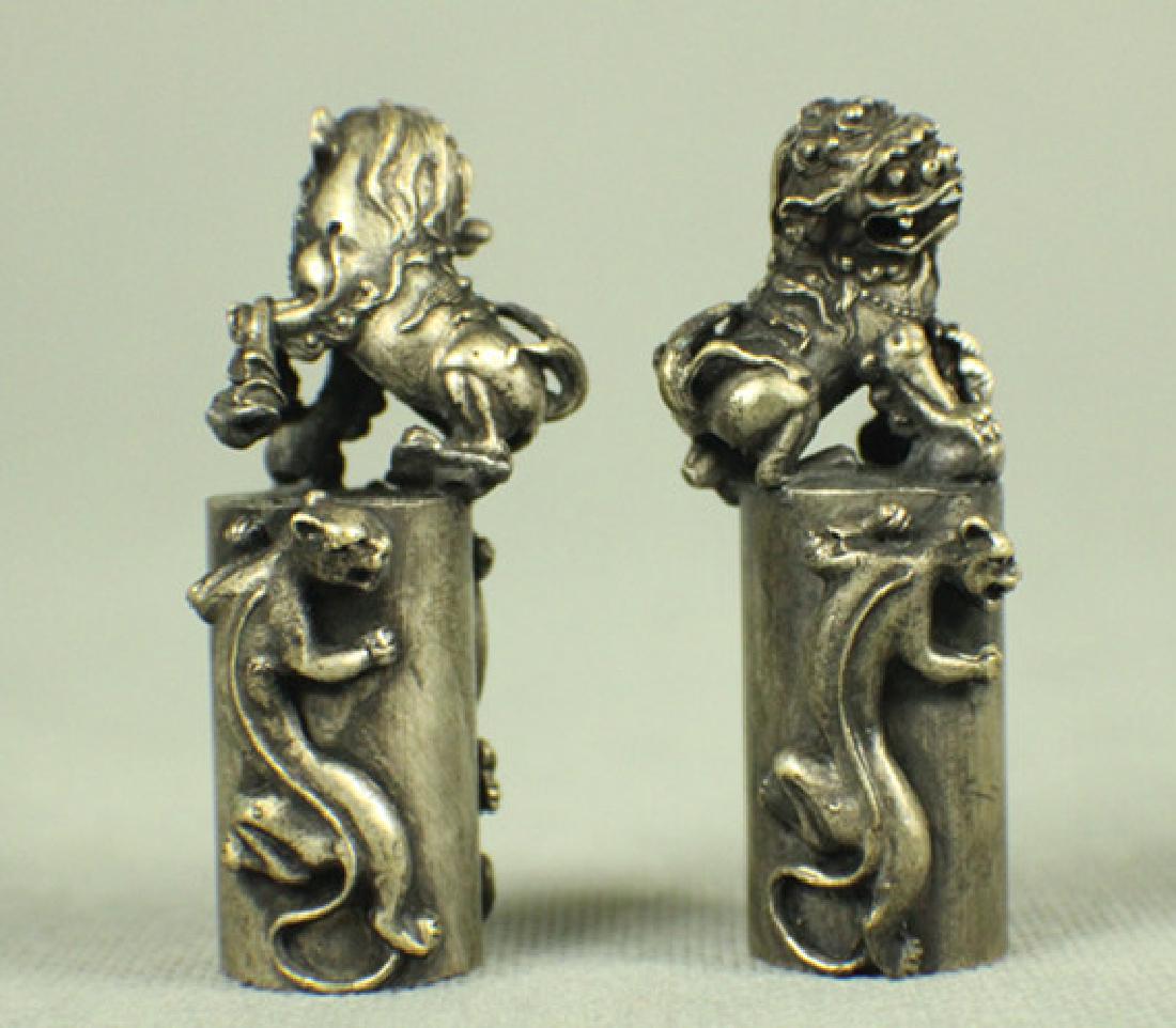 A pair of bronze seals with lion top: A pair of bronze seals with lion topï¼Œ H:3 1/2"