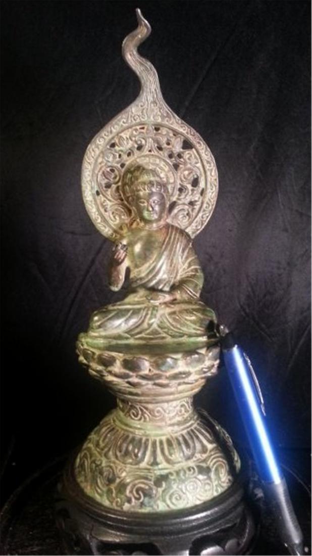 Copper Buddha statue