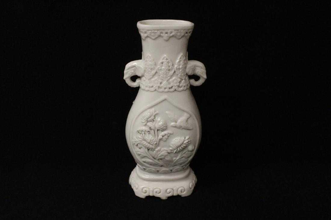 An Old vintage Chinese white porcelain vase in carved (1 of 10)