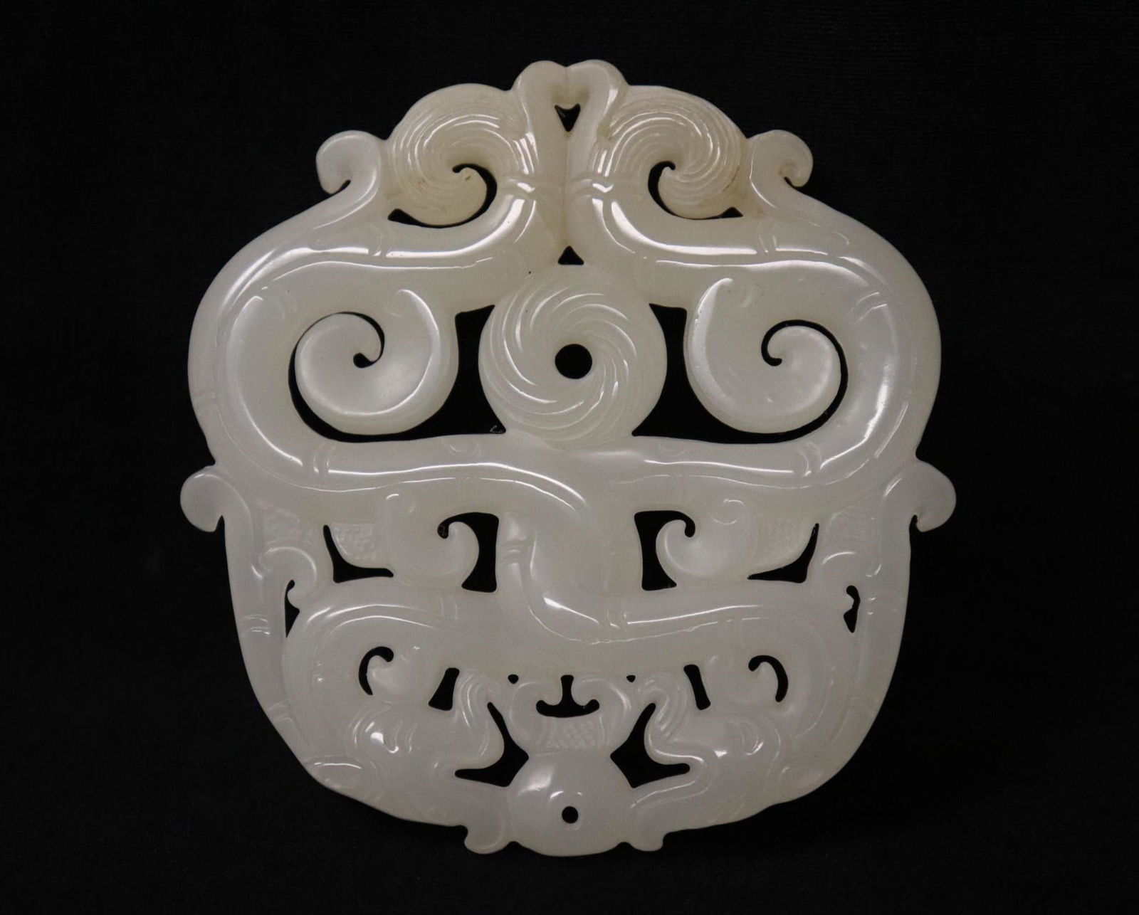 A Fine Hand-carved white jade ornament, (1 of 9)