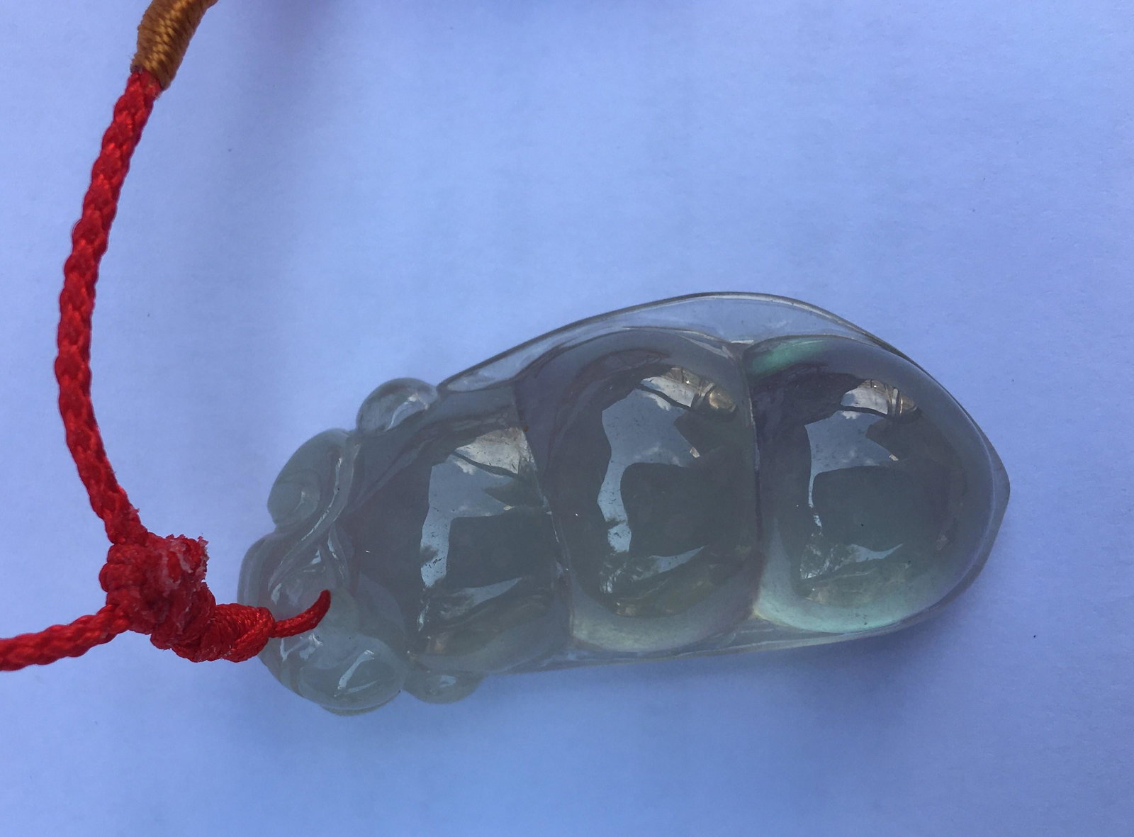 A Jadeite Pendant in Bean Panttern: A Jadeite Pendant in Bean Panttern, 2 x 1"