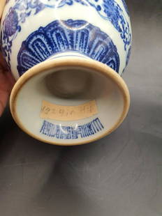 Qing Dynasty Yongzheng blue and white lotus with open mouth goblet: Qing Dynasty Yongzheng blue and white lotus with open mouth goblet Height about 7.90CM Diameter about 12.80CM Foot diameter about 3.80CM