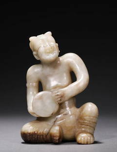 White Old Jade Figure Playing Drum: Old Jade Figure Playing Drum, good handwork, very smooth surface all over in a big size. L 2.75&rdquo;, W 1.25&rdquo;, H 3.75&rdquo;, Weight 223.5g