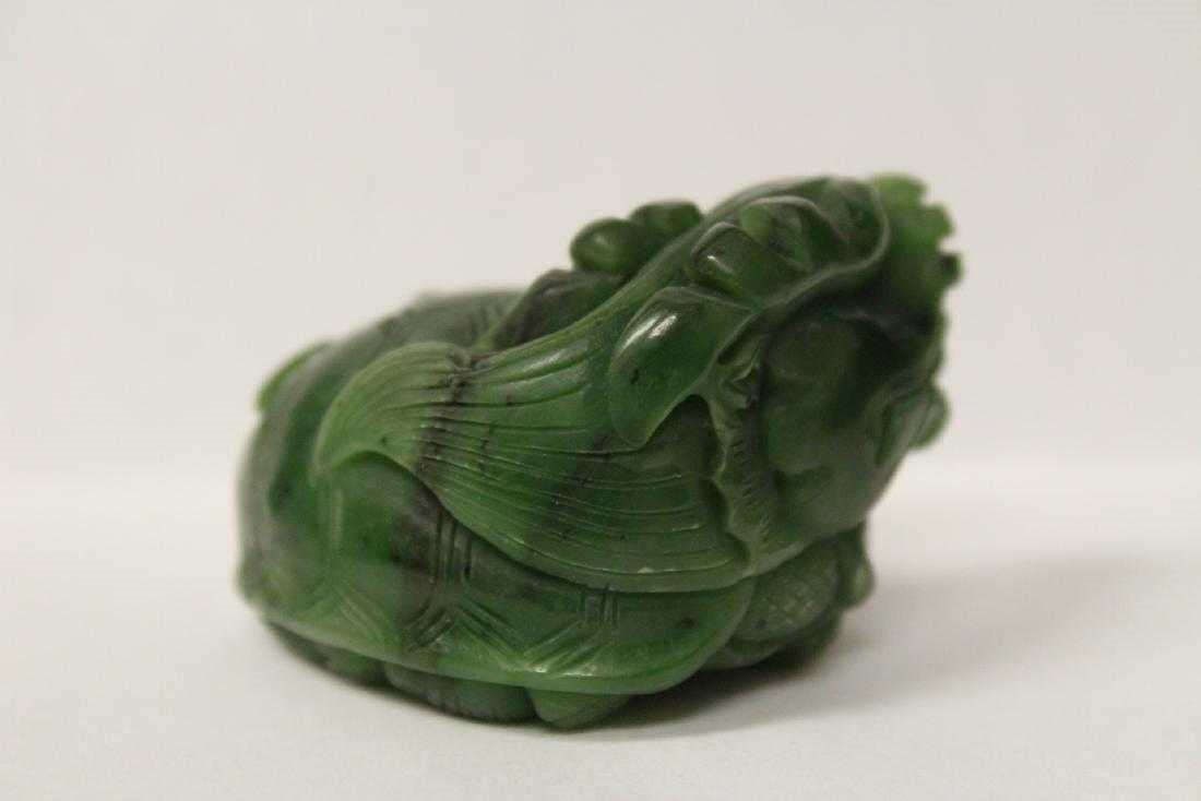A Paper weight, a green jade carved Qilin, 1.5"Hx2.1"x1.75": A Paper weight, a green jade carved Qilin, 1.5"Hx2.1"x1.75"