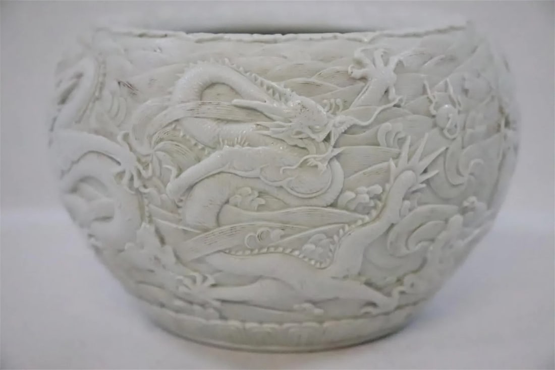 Unusual Chinese carved white porcelain brush-washer with dragon, marked Qing, Qianlong,: Unusual Chinese carved white porcelain brush-washer with dragon, marked Qing, Qianlong, 3.7"Hx5.75"dia