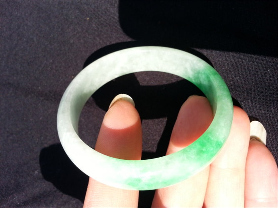 China Jadeite bangle. Diameter 2 3/4 in.""": Jadeite bangle. Diameter 2 3/4 in."""