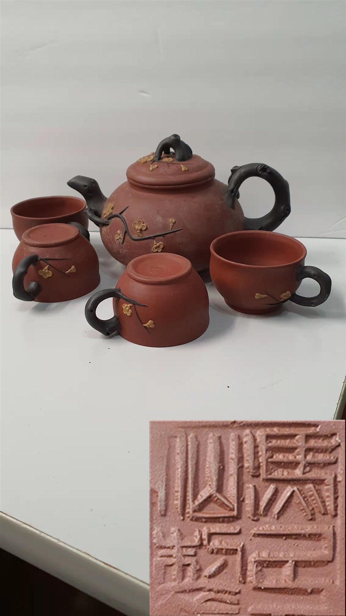 old. Purple clay teapot.: old. Purple clay teapot.Wooden pallets not included